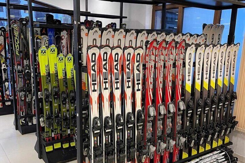 A rack of skis in a store. 5