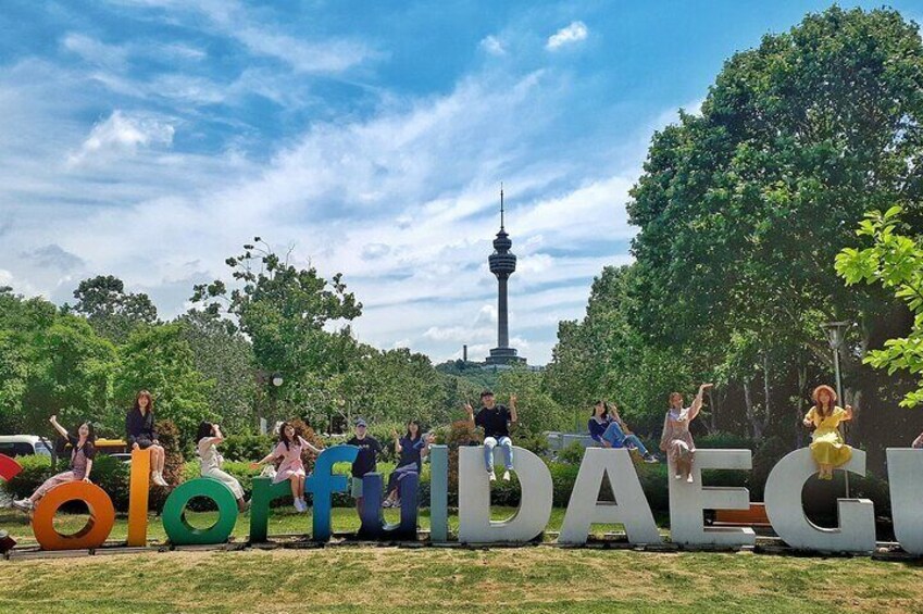 People posing with colorful letters spelling "colorfulDAEGU". 4