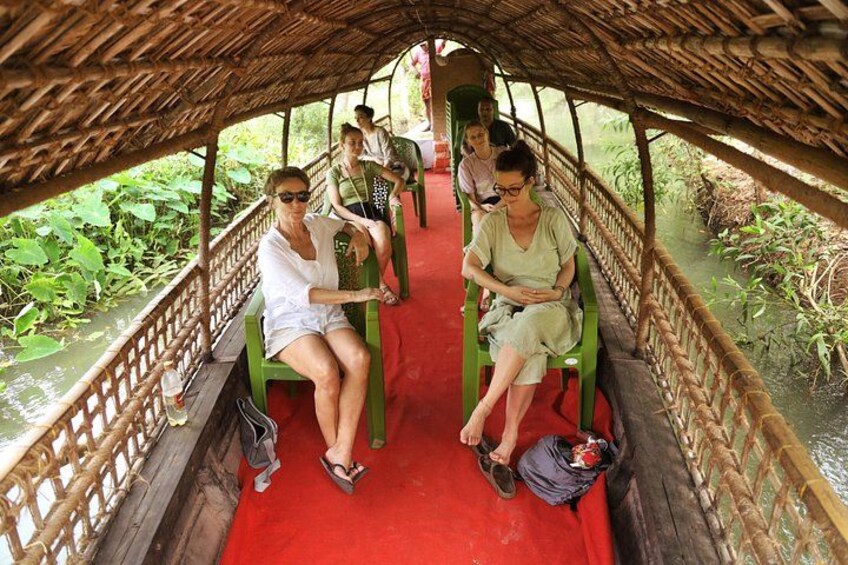 Experience the timeless beauty of Kerala's backwaters from the deck of these majestic boats, as you navigate through tranquil waters surrounded by lush greenery. 1