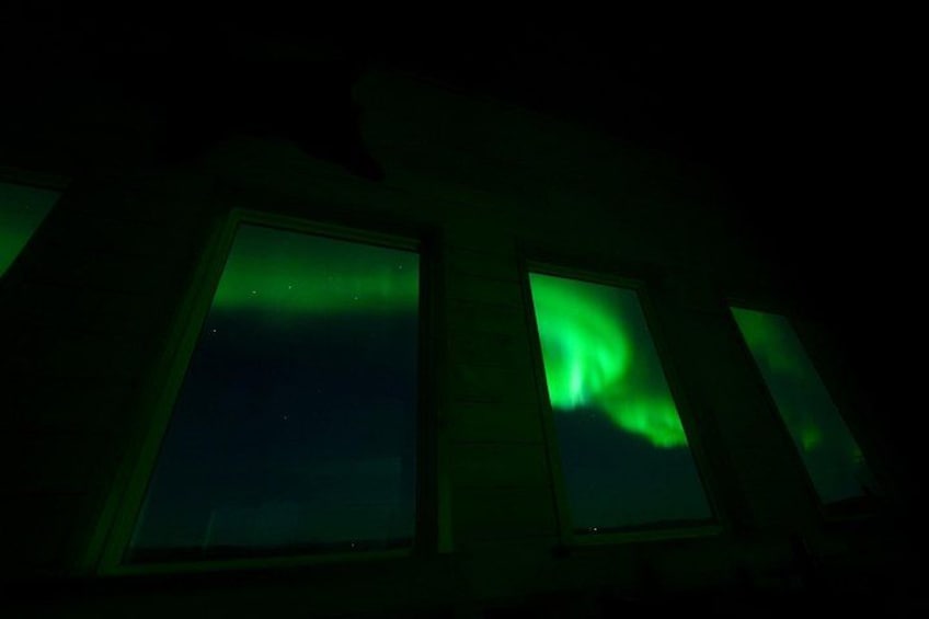 She is just outside the windows. 4
