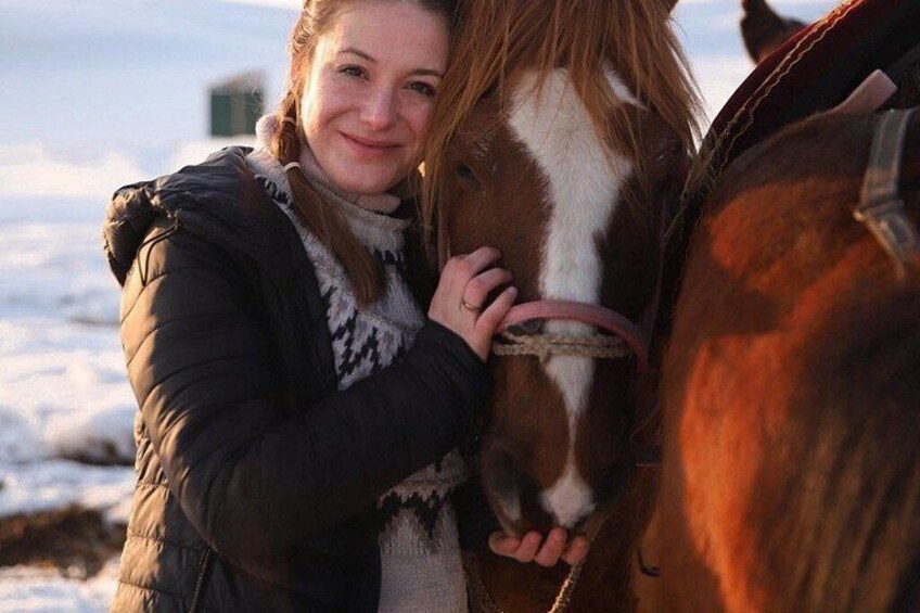 A person hugging a horse. 5