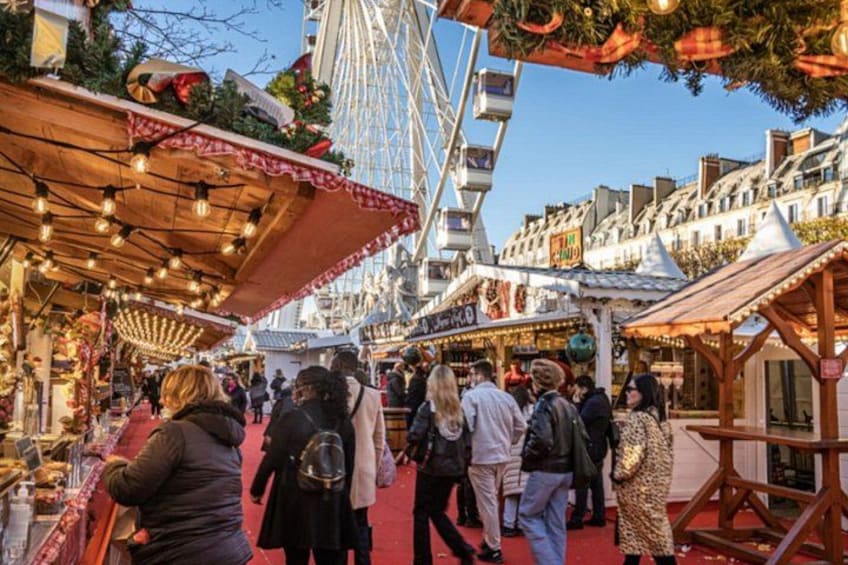 A bustling market with stalls, a Ferris wheel, and a red carpet. 5