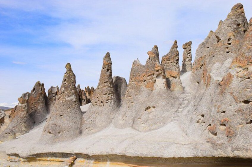 A landscape with unique rock formations. 3