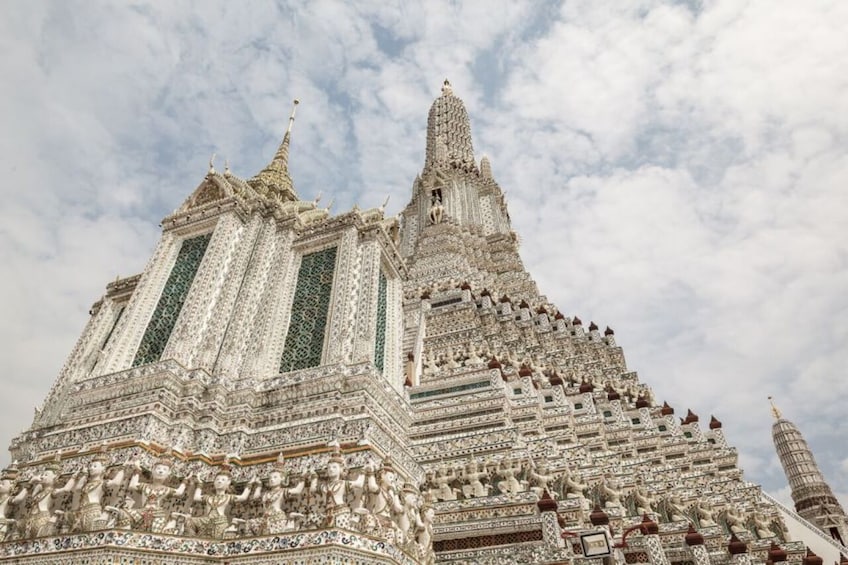 A detailed temple with ornate carvings and multiple spires. 5