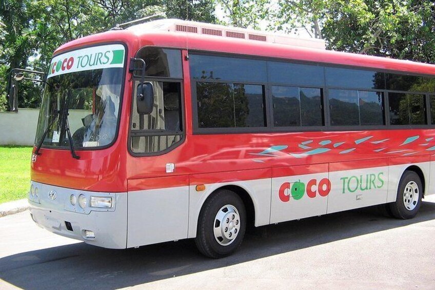 A Cocotours bus with 33 seats