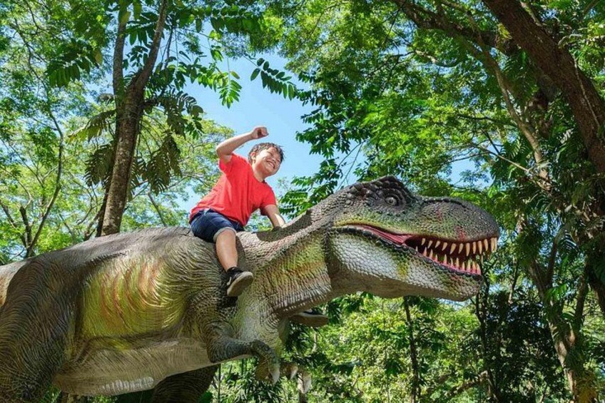 Enjoying one of our Dinosaurs at the Dino Park. 2