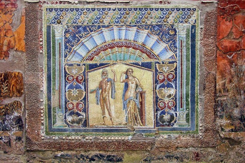 A mosaic with geometric patterns and figures. 2