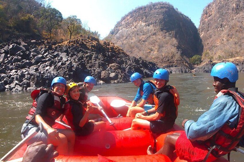 Kids smiling during the tour while rafting with Shockwave Adventures 4