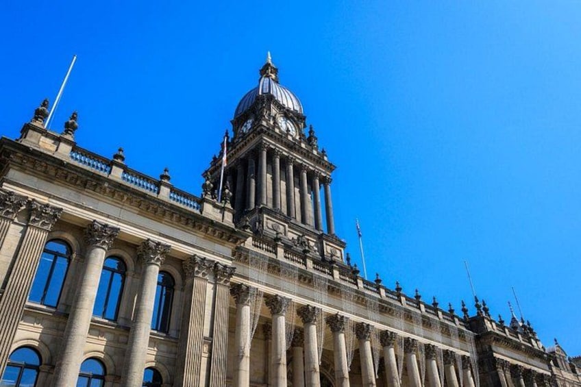 A grand neoclassical building with a large dome and columns. 2
