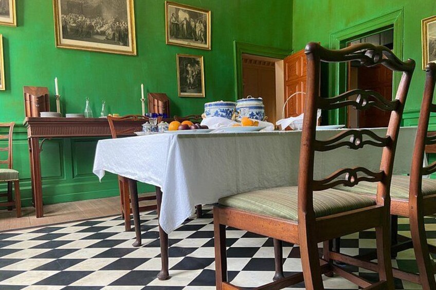 Mount Vernon dining room featuring original-style furnishings where George Washington hosted guests and dignitaries. 2
