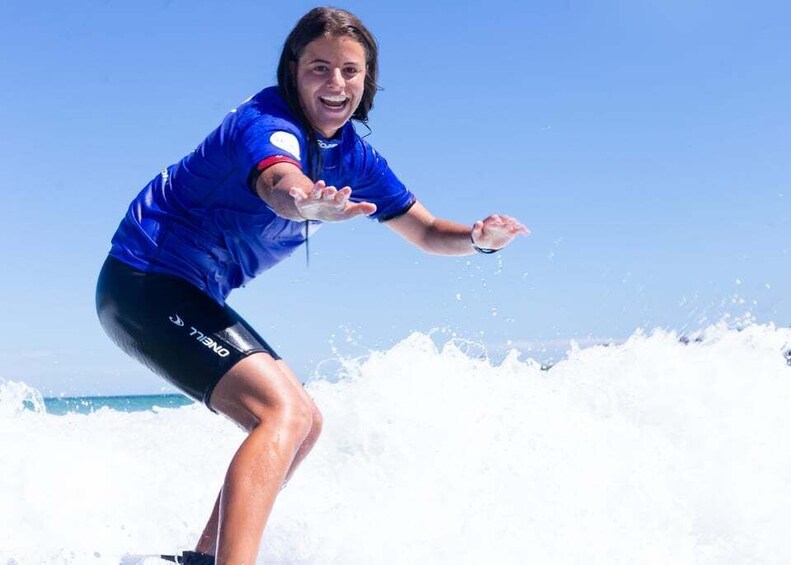 A person surfing on a wave. 3