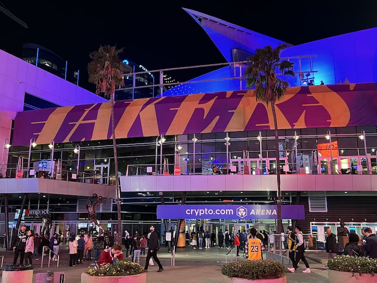 A brightly lit building with the word 'FAKIR' prominently displayed. 4