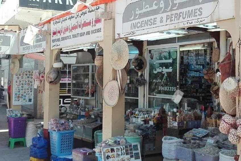 A market with stalls selling incense and perfumes. 2