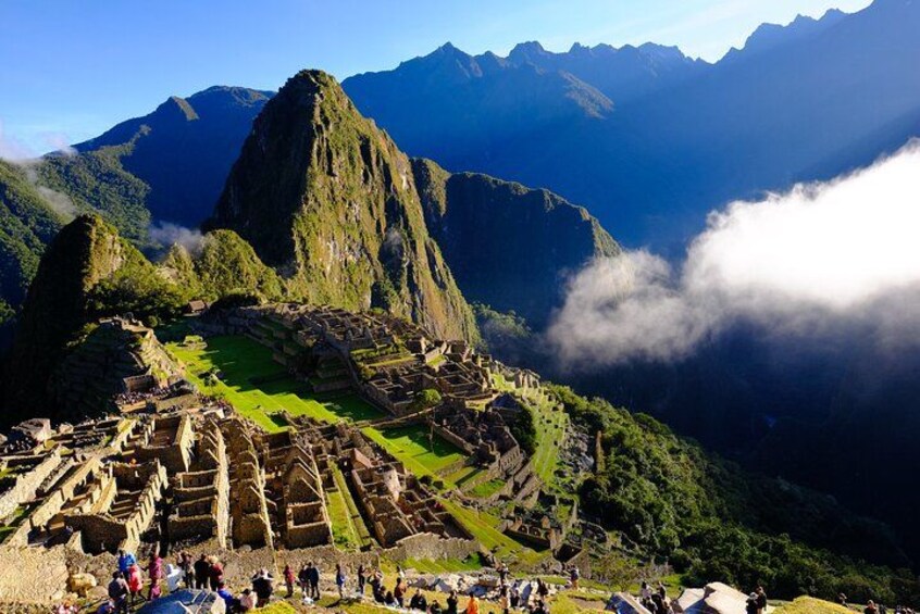 Machu Picchu ruins, Inca terraces, and surrounding mountains. 3