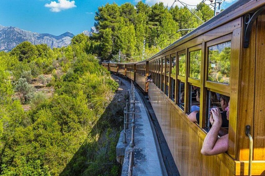 Island Tour with Train Tram Boat and Bus from Cala Millor 2