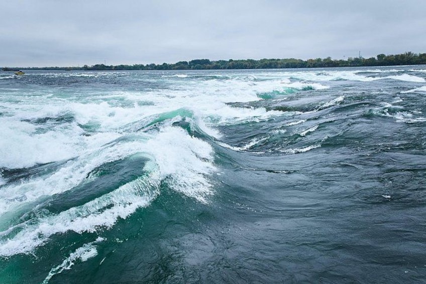 Turbulent ocean waves with a distant shoreline. 4