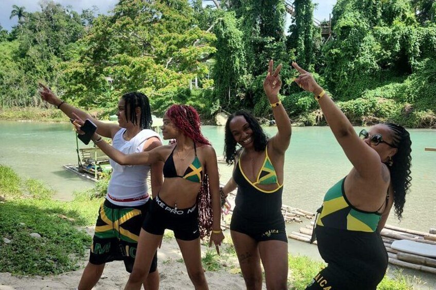 Four people dancing by a river. 4