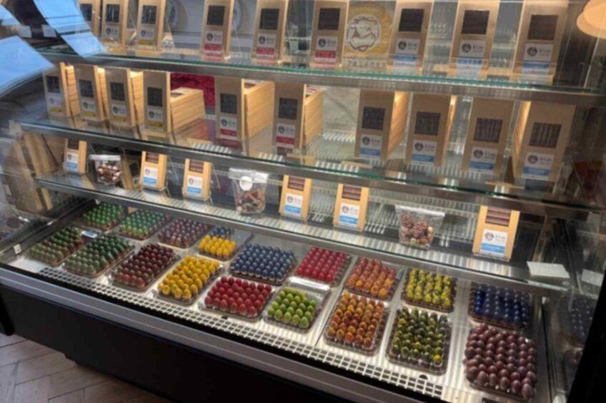 A candy display with various types of chocolates and candies. 2