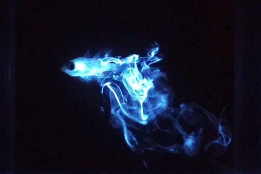 A blue light display against a dark background. 2