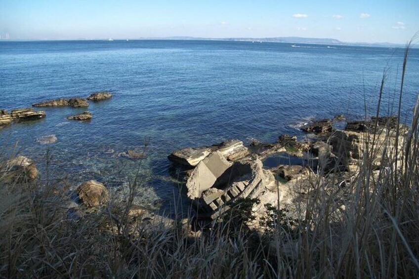 Parts of the previous lighthouse that damaged in the earthquake can be seen in the sea below the lighthouse.