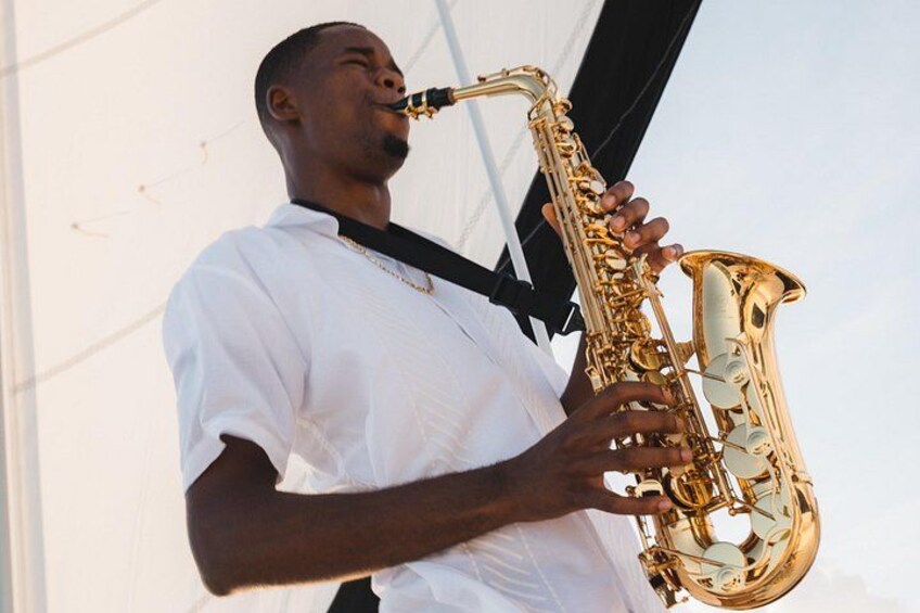 A person playing a saxophone. 3