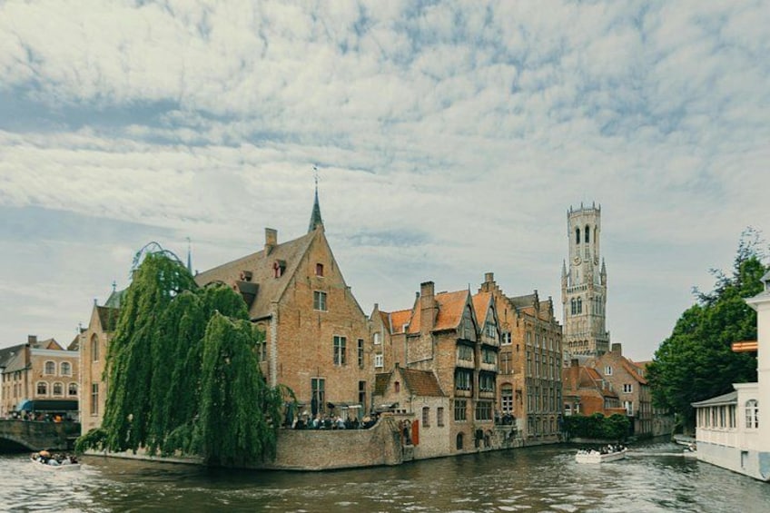 A river with buildings and a tower. 3