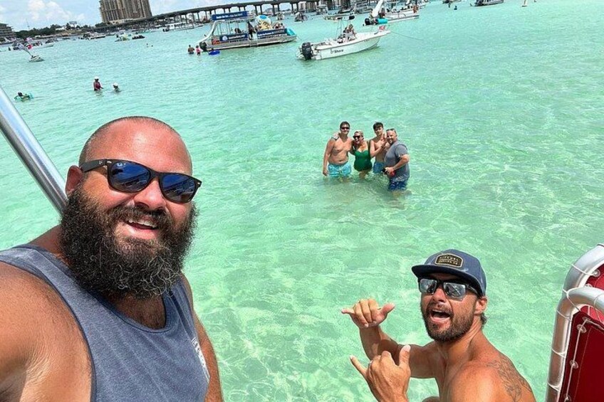 SunVenture Captains with cruise guests at Crab Island 2
