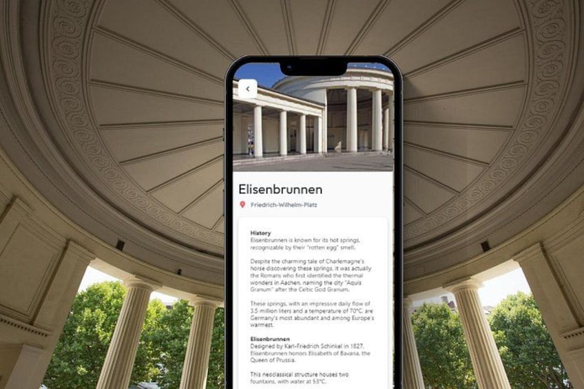 A smartphone displaying information about Elisenbrunnen, including its history and location at Friedrich-Wilhelm-Platz. 5