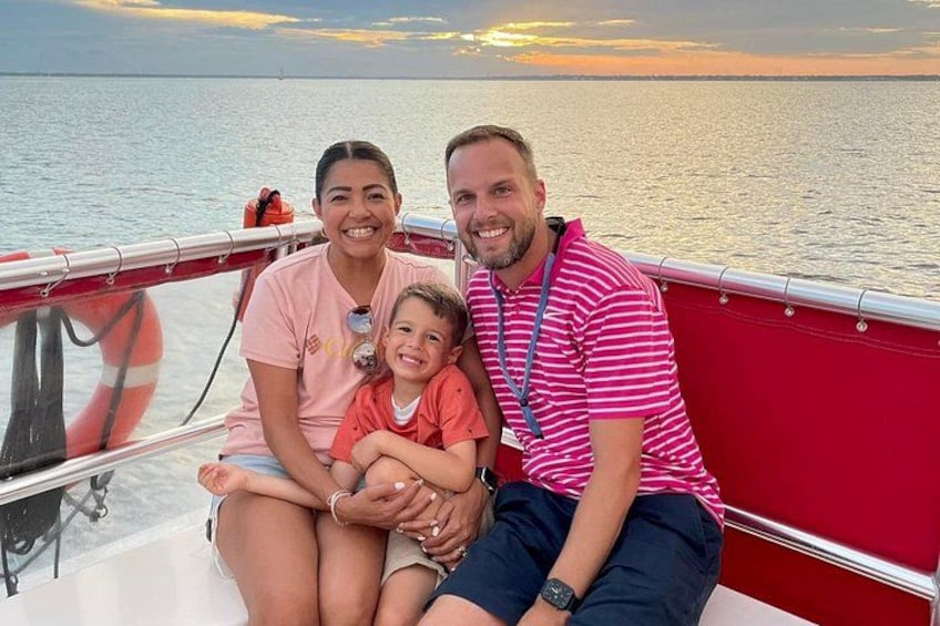 Family Enjoying Eco-Dolphin Cruise on SunVenture 2