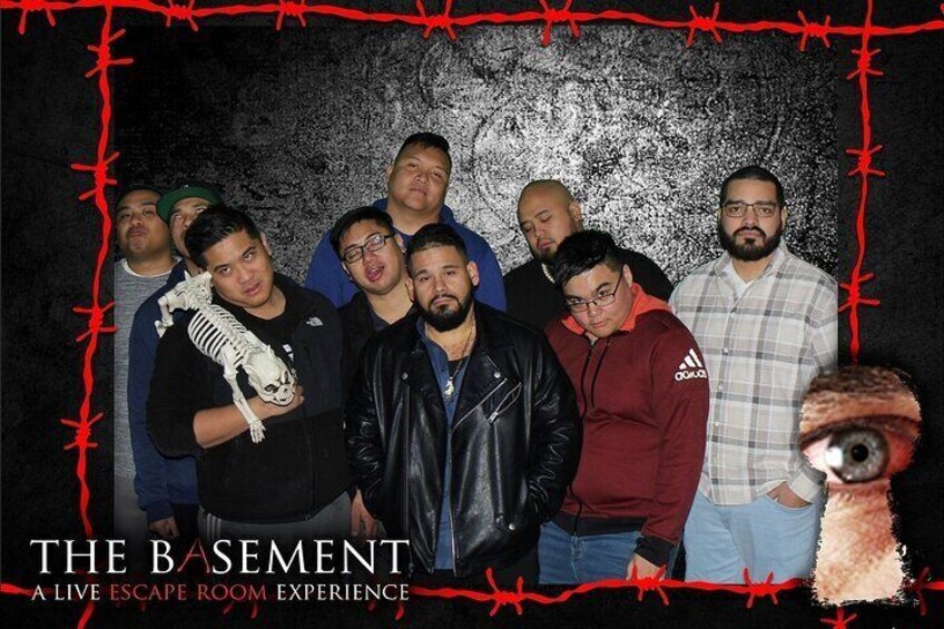 Group souvenir photo at THE BASEMENT: A Live Escape Room Experience in Las Vegas, NV