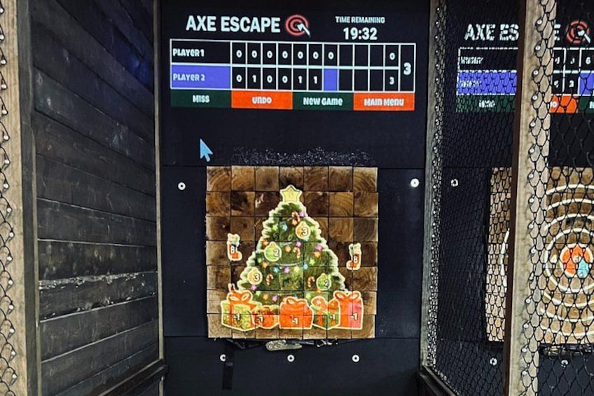 A game interface with a Christmas tree and presents, a timer, and a scoreboard. 3