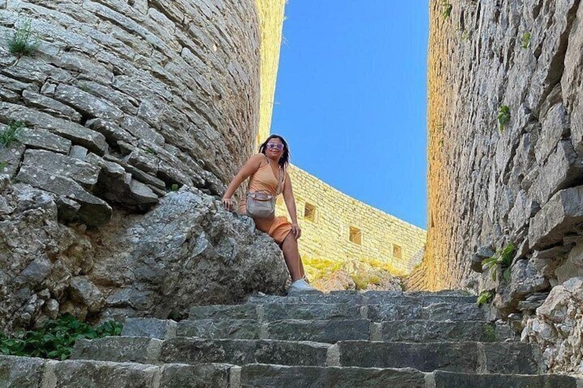 Srebrenik fortress is a stunning historical site with stone towers and reflections of the sun. It's the perfect place to visit during the summer and capture amazing images. 4