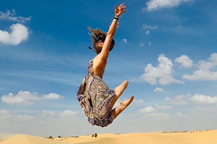 Abu Dhabi Desert Safari with Camel Ride BBQ Dinner and Live Shows 2
