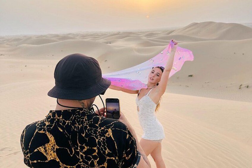 Abu Dhabi Desert Safari with Camel Ride BBQ Dinner and Live Shows 4