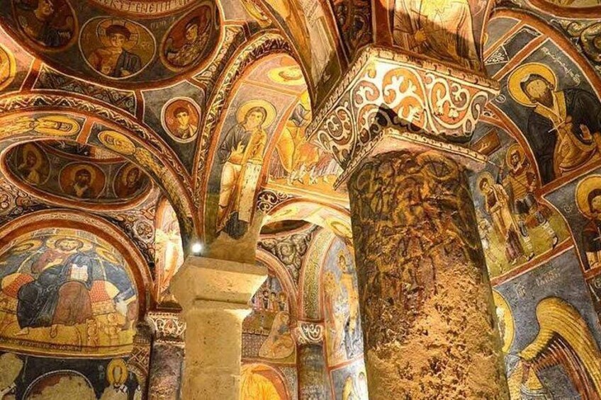 A richly decorated interior with intricate mosaics and religious iconography. 2