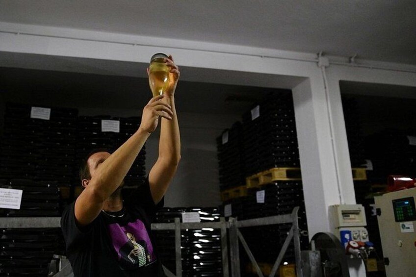 A person holding a trophy. 3