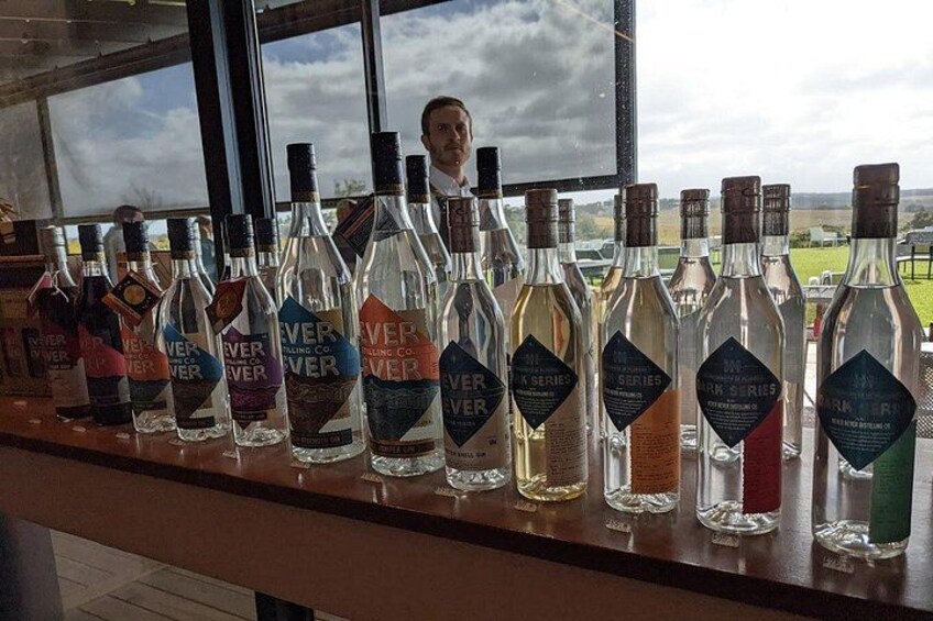 A bar with various bottles of liquor. 4