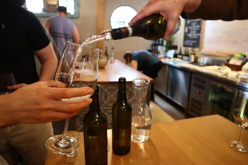 Professional wine service at Soumah cellar door with premium varietals 2