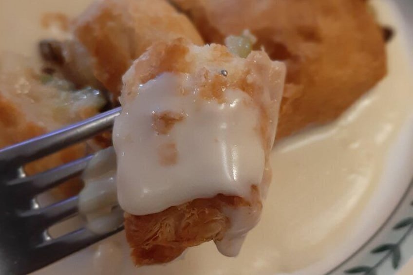 A piece of food with a fork. 4
