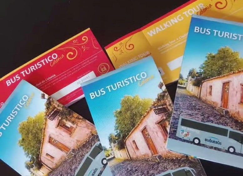Brochures for Bus Turistico with images of a rustic building and a bus. 3