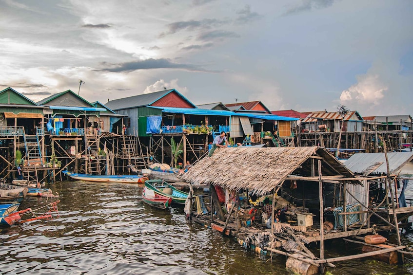 A floating village with colorful houses and boats. 2