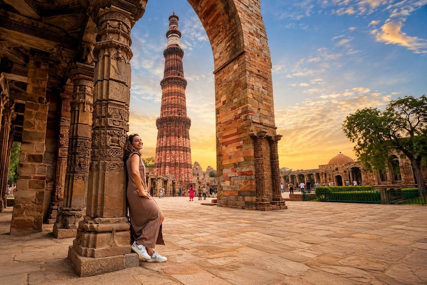 A historical structure with intricate carvings and a prominent tower. 2
