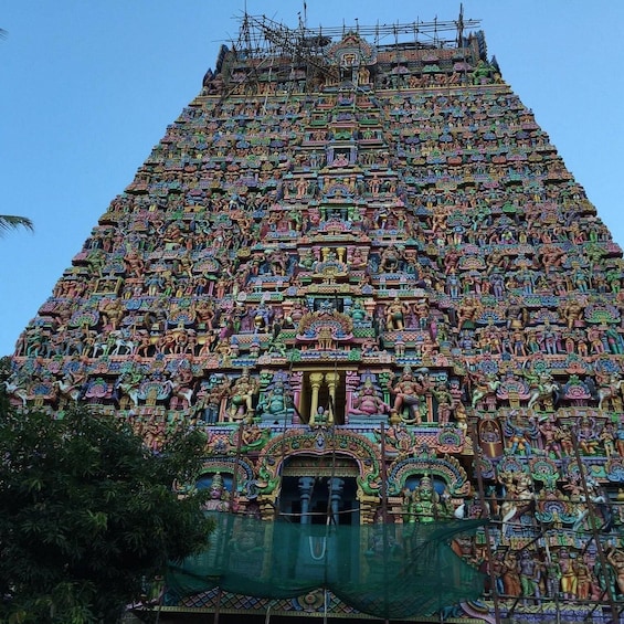 A multi-tiered temple with intricate carvings and sculptures. 3