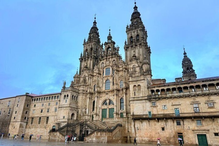 A historic cathedral with two prominent towers and a large entrance. 1