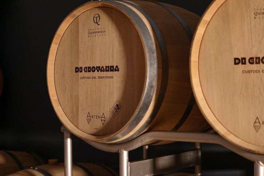 Wooden wine barrels with labels. 2