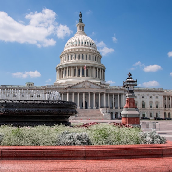 The United States Capitol building with a fountain in the foreground. 4