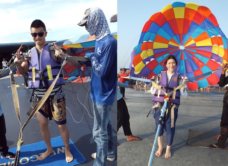 Persone che si preparano per un volo in mongolfiera, con palloncini colorati e imbracature di sicurezza. 2