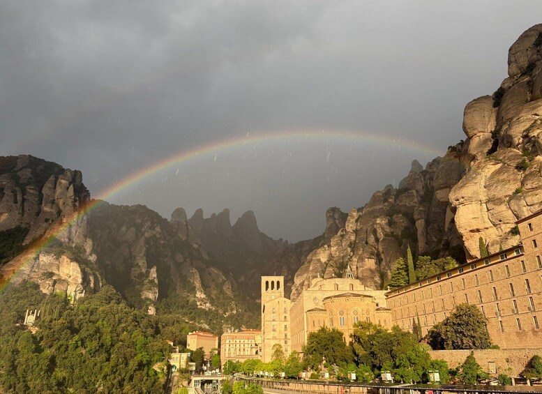 A cathedral with a rainbow in the background. 5
