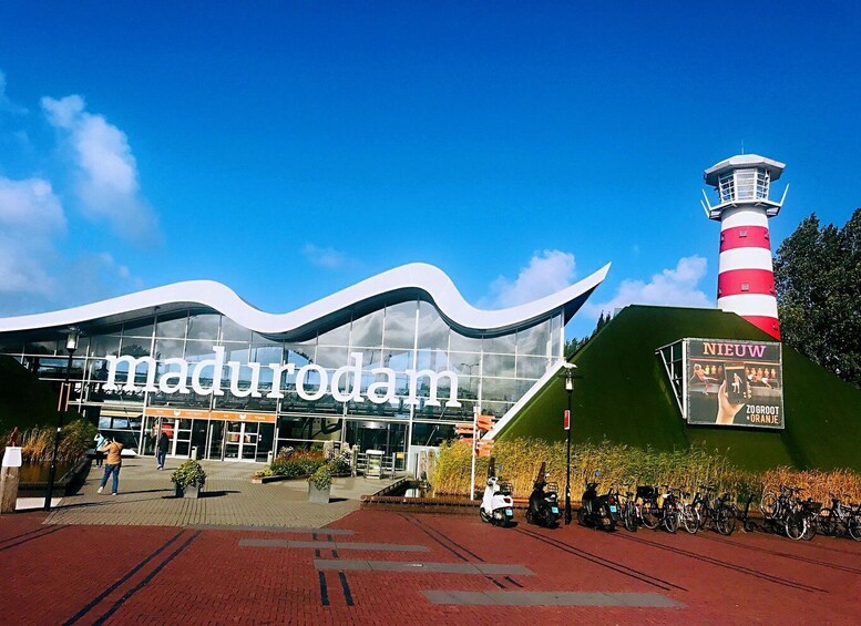 The entrance to the Madurodam complex with a distinctive red and white lighthouse. 4