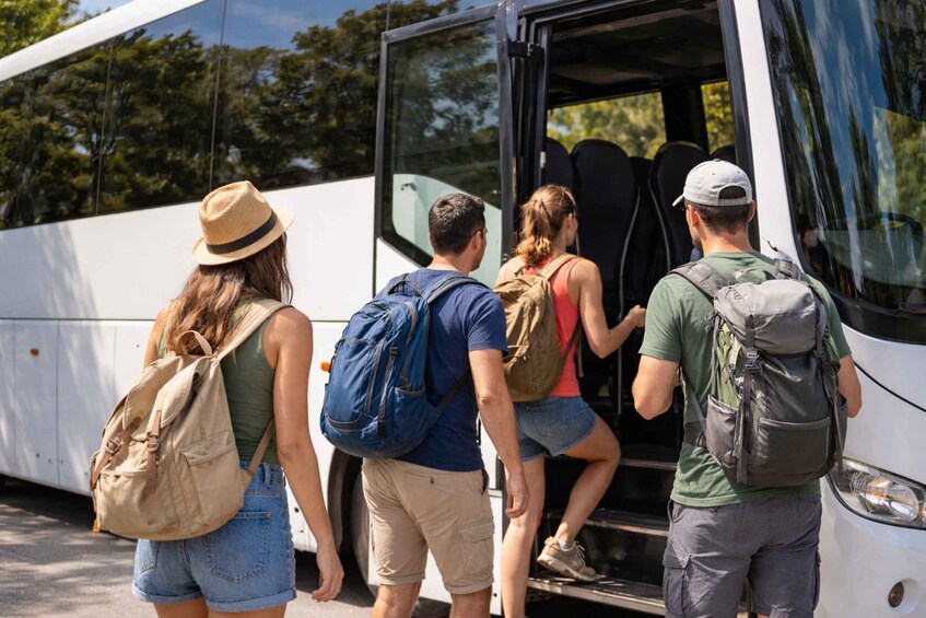People boarding a bus. 2